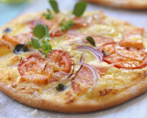 Prøv også Pizza med røykt ørret og tomat.